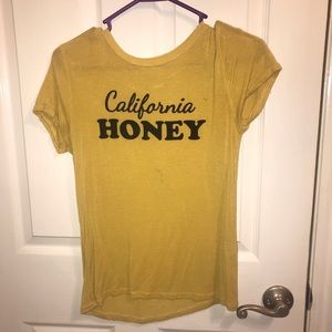 yellow- “california honey” shirt.